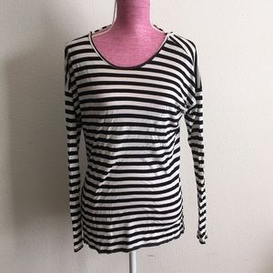 Black and white striped blouse.